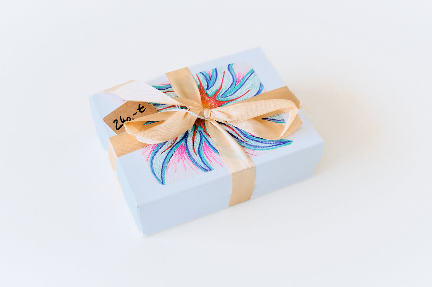 Die 12-Wochen-Box als Geschenk verpackt mit Satinband