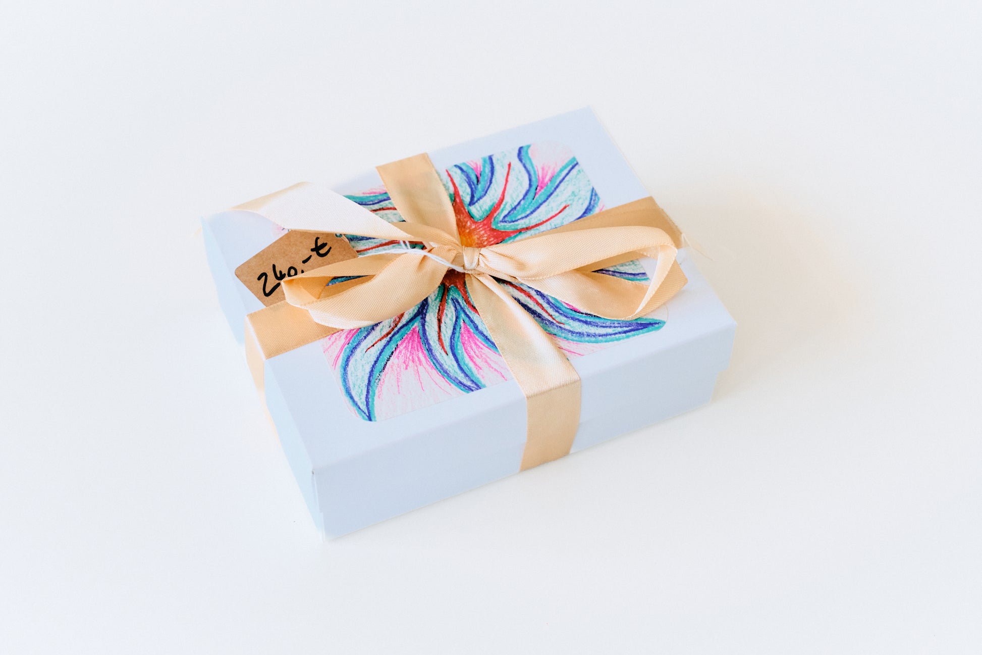 Die 12-Wochen-Box als Geschenk verpackt mit Satinband